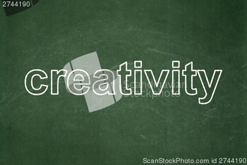 Image of Advertising concept: Creativity on chalkboard background