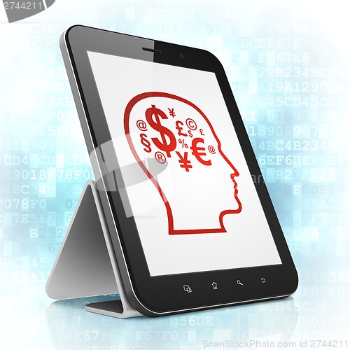 Image of Advertising concept: Head With Finance Symbol on tablet pc computer
