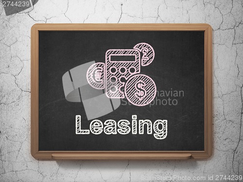 Image of Business concept: Calculator and Leasing on chalkboard background
