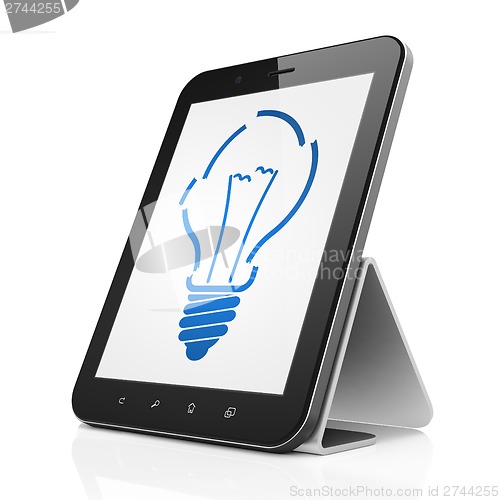 Image of Finance concept: Light Bulb on tablet pc computer