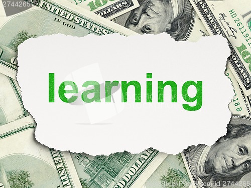 Image of Education concept: Learning on Money background