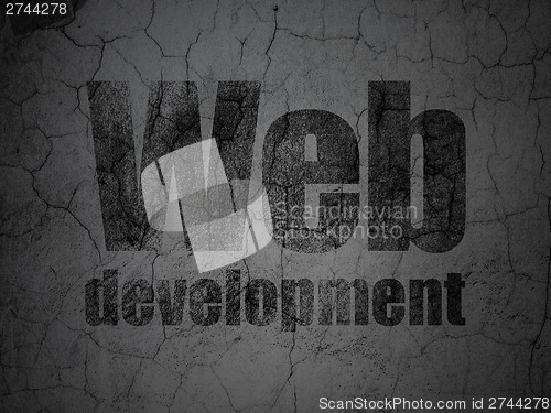Image of Web design concept: Web Development on grunge wall background