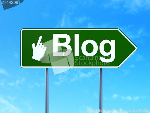 Image of Web development concept: Blog and Mouse Cursor on road sign background