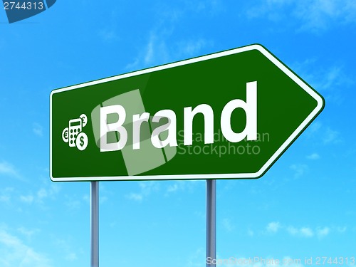 Image of Marketing concept: Brand and Calculator on road sign background