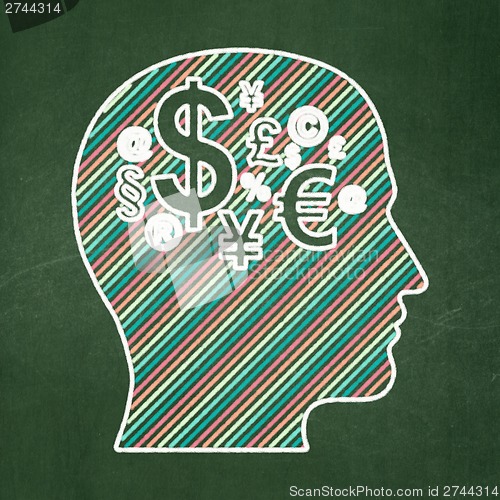 Image of Finance concept: Head With Finance Symbol on chalkboard background