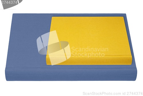 Image of Blue and yellow books isolated on white