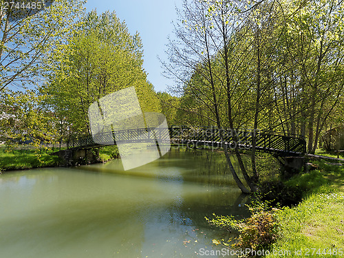 Image of Metallic footbridge on the Indrois river, France