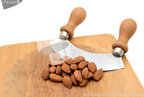 Image of Whole almonds with a rocking knife