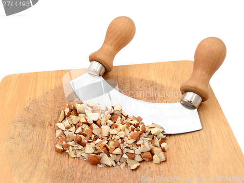 Image of Chopped almonds with a rocking knife
