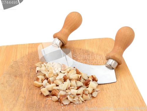 Image of Chopped brazil nuts with a rocking knife