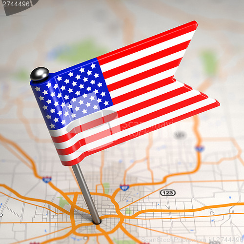 Image of United States of America Small Flag on a Map Background.