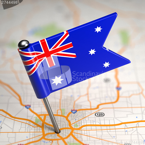 Image of Australia Small Flag on a Map Background.