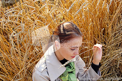 Image of Woman and wheat ears