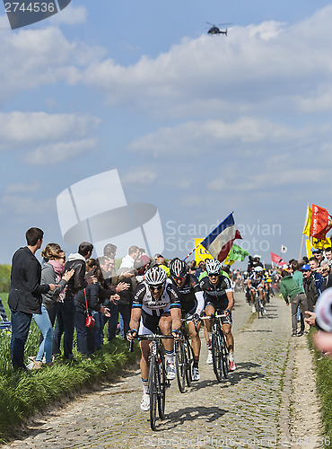 Image of Group of Three Cyclists- Paris-Roubaix 2014