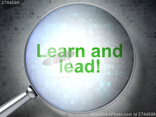 Image of Education concept: Learn and Lead! with optical glass