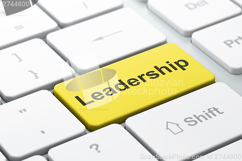 Image of Finance concept: Leadership on computer keyboard background