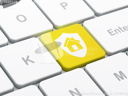Image of Finance concept: Shield on computer keyboard background