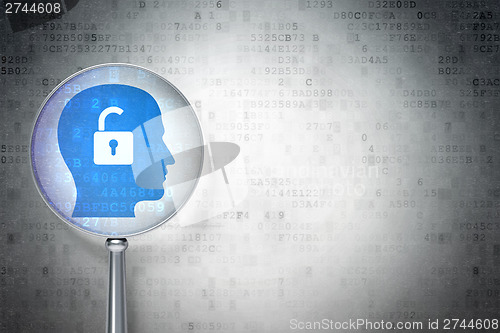 Image of Business concept:  Head With Padlock with optical glass on digit