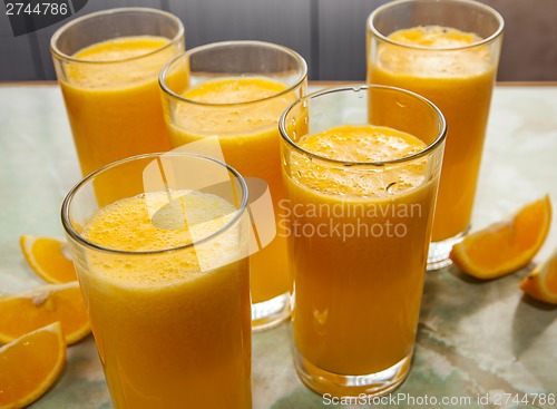 Image of orange juice and fruits