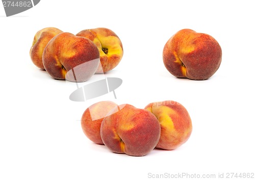 Image of Set of tasty juicy peaches with slices on a white background
