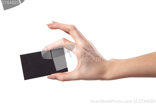 Image of Businesswoman's hand holding blank business card