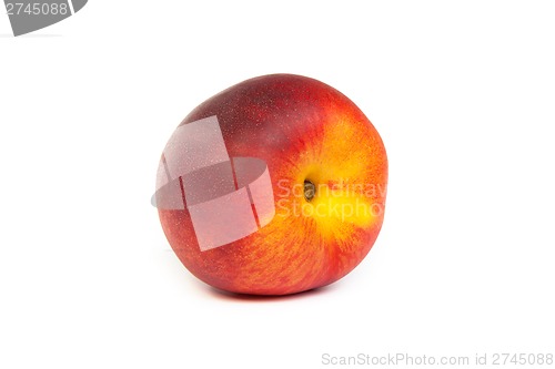 Image of Three fresh nectarines on white