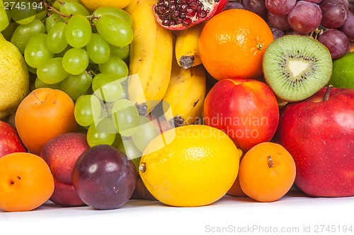 Image of Huge group of fresh fruits isolated on a white background.