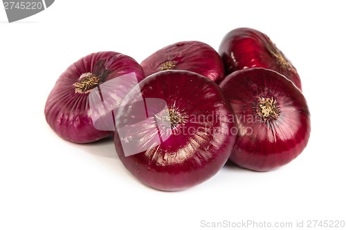 Image of Group of a red onions, isolated on white