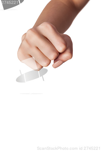 Image of Female hand with a clenched fist isolated