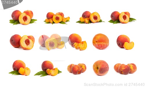 Image of Set of tasty juicy peaches with slices on a white background