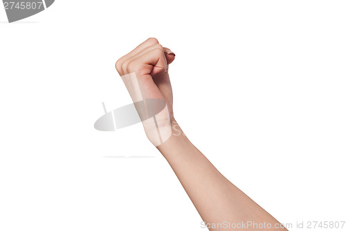 Image of Female hand with a clenched fist isolated