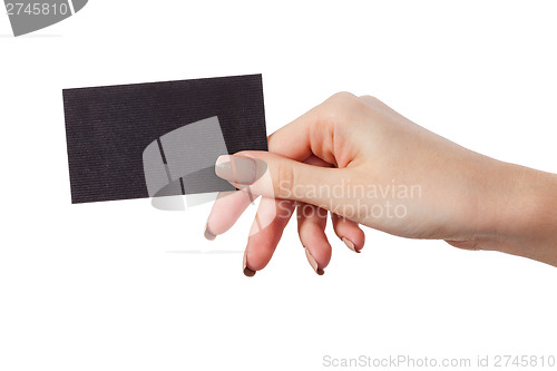 Image of Businesswoman's hand holding blank business card