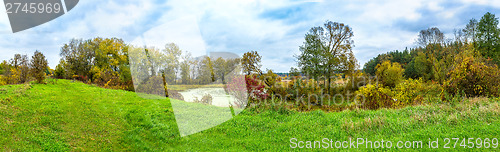 Image of Forest lake in fall. Panorama