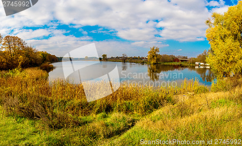 Image of Forest lake in fall. Panorama