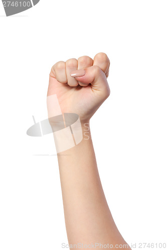 Image of Female hand with a clenched fist isolated