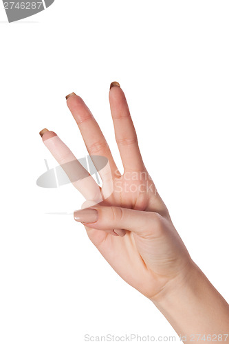 Image of Three fingers being held in the air by a male hand