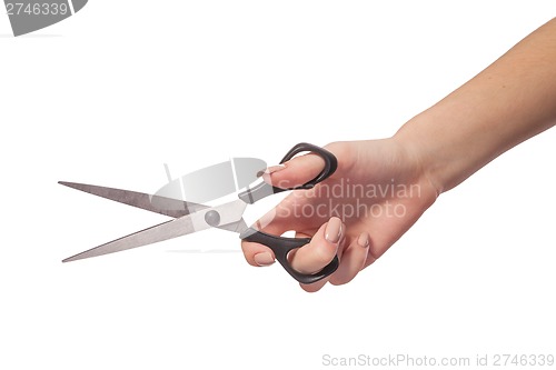 Image of Hand is holding scissors isolated