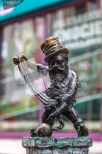 Image of Sculpture of gnome from fairy-tale in Wroclaw