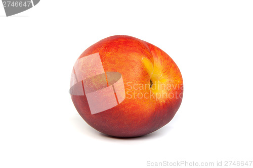 Image of Three fresh nectarines on white