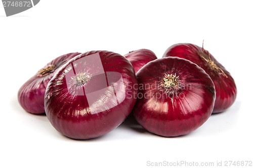 Image of Group of a red onions, isolated on white