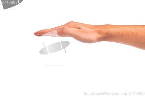 Image of Open palm hand gesture of male hand