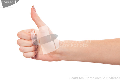 Image of Female hand showing thumbs up sign isolated on white