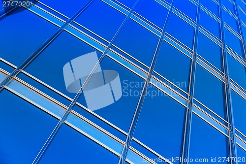 Image of modern blue glass wall of skyscraper