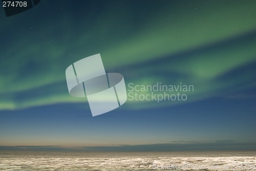 Image of Aurora strips parallel to twilight horizon