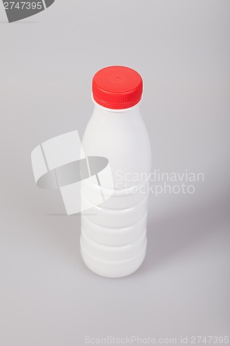 Image of White Yogurt Plastic Bottle with red cap