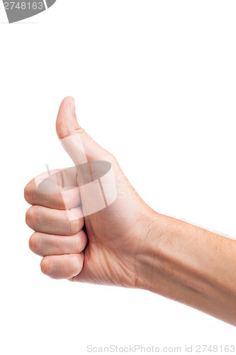 Image of Male hand showing thumbs up sign isolated on white