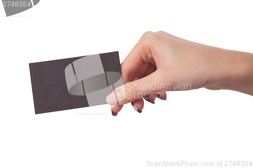 Image of Businesswoman's hand holding blank business card