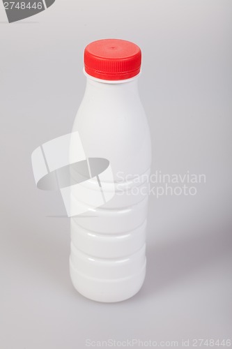 Image of White Yogurt Plastic Bottle with red cap