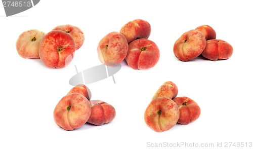 Image of Set of ripe fig peaches on white