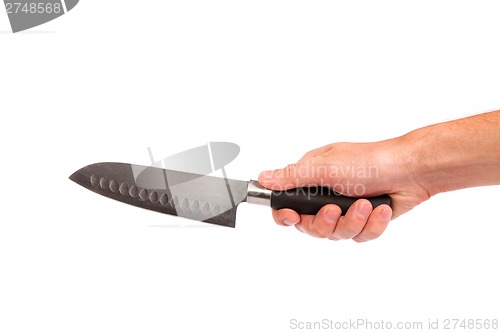 Image of Hand is holding a kitchen kinfe isolated